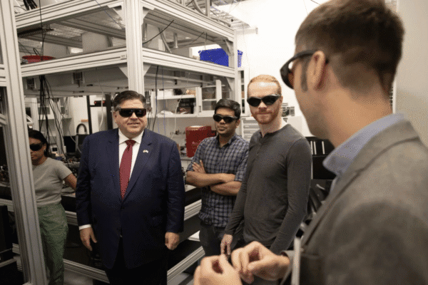 Gov. Pritzker speaking with researchers at University of Chicago quantum lab
