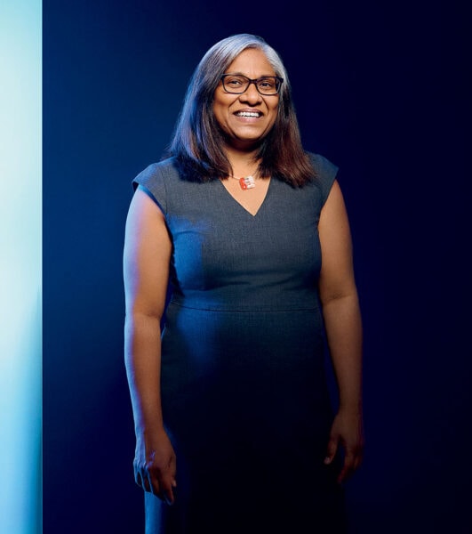 Dr. Preeti Chalsani in front of a blue background
