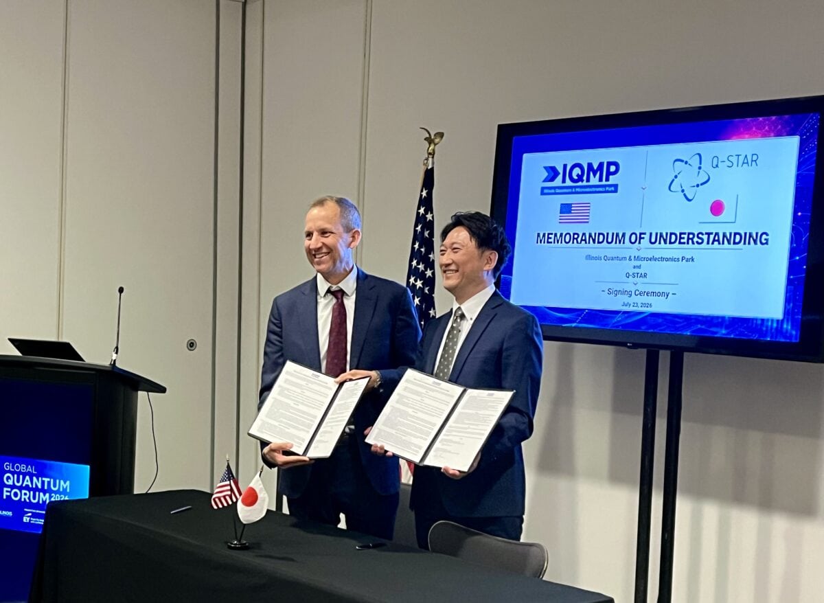 Harley Johnson, CEO of the IQMP, and Hirofumi Mori, Chair of the Global Consortium Alliances Working Group at Q-STAR, posing for a photo after signing an MOU at the Global Quantum Forum in Chicago